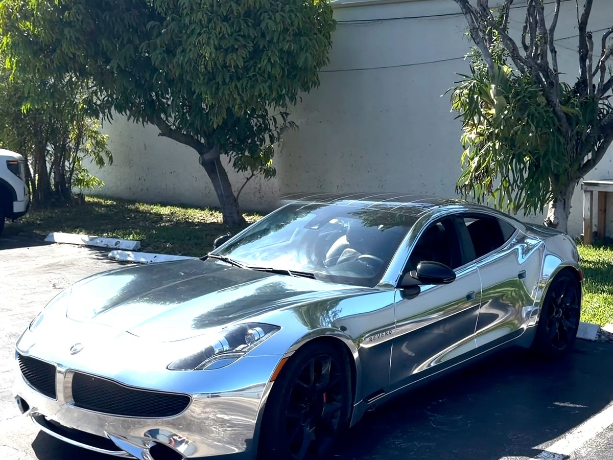 Karma Revero in a mirror chrome wrap