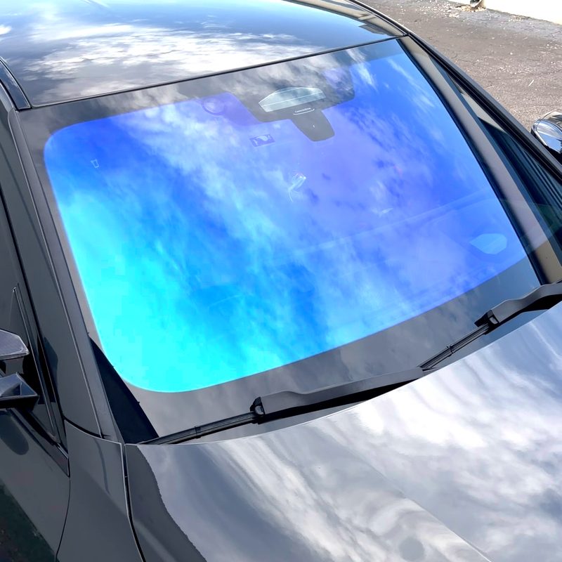 Chameleon-tinted windshield