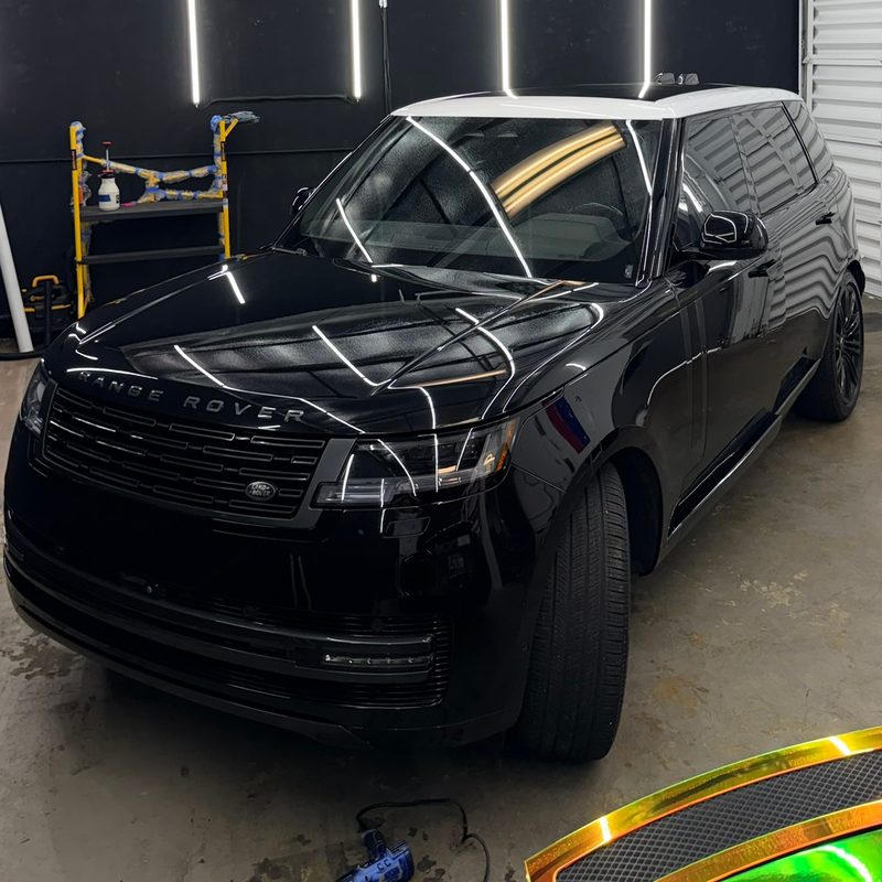 Black Range Rover in the bay