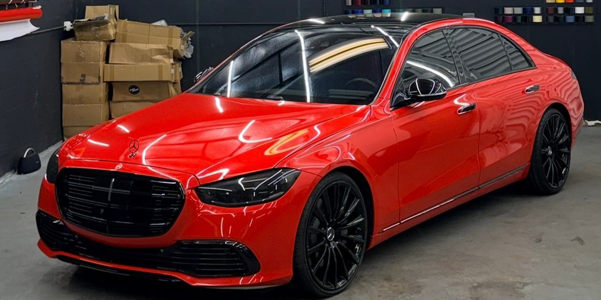 Mercedes S-Class in red with a black roof
