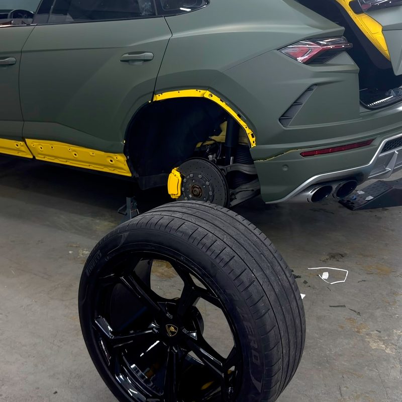 Lamborghini Urus with a wheel off